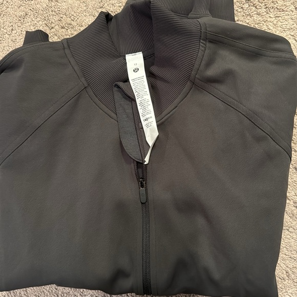Brand New Women’s Lululemon Wunder Train Track Jacket Size 12 & Color dark Grey - Picture 4 of 5
